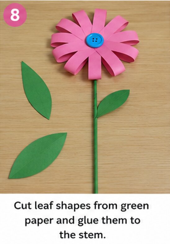 cut leaf shapes from green paper and glue them to the stem