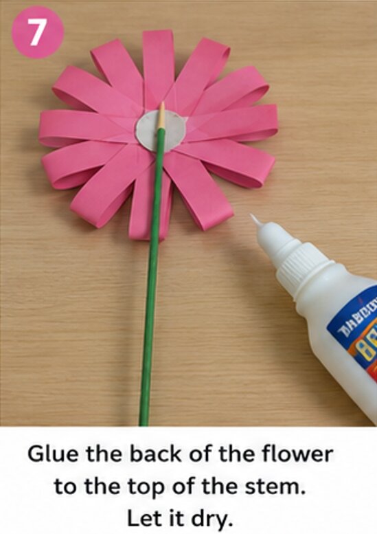 glue the back of the flower to the top of the stem