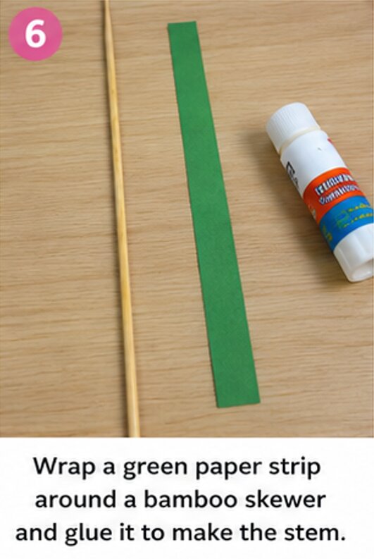 wrap a green paper strip around a bamboo skewer and glue it to make the stem